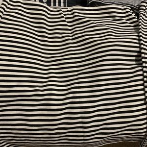 Five, knee-length skirts. All different patterns